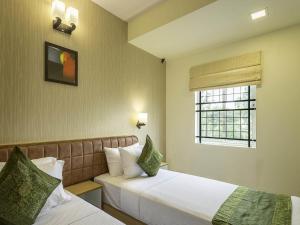 treebo akshaya mayflower vijaya bank layout
