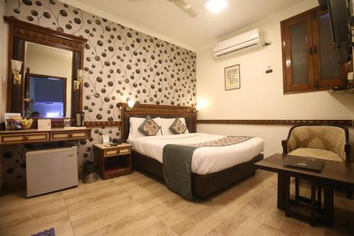 hotel amar inn by quadis lajpat nagar