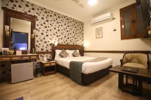 hotel amar inn by quadis lajpat nagar