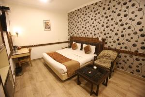 hotel amar inn by quadis lajpat nagar