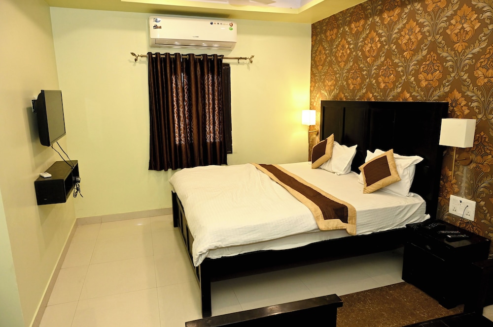 om heritage hotel