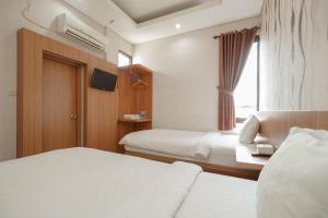 green apple residence near sarinah mitra reddoorz