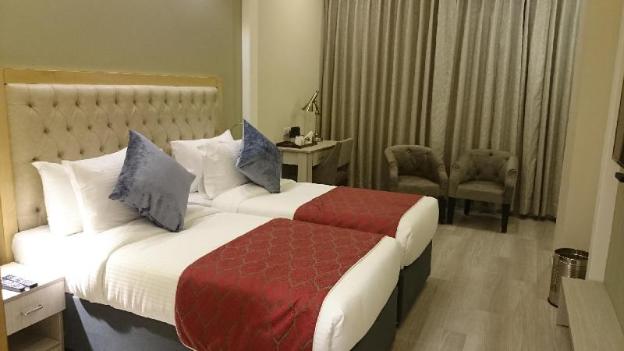 mango hotels naveen davangere