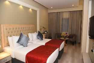 mango hotels naveen davangere