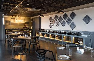 mango hotels naveen davangere