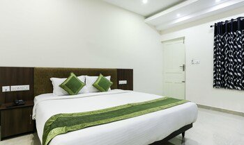 Treebo Cmks Habitat Center, Cochin,Eramalloor>>Chempu,3 star