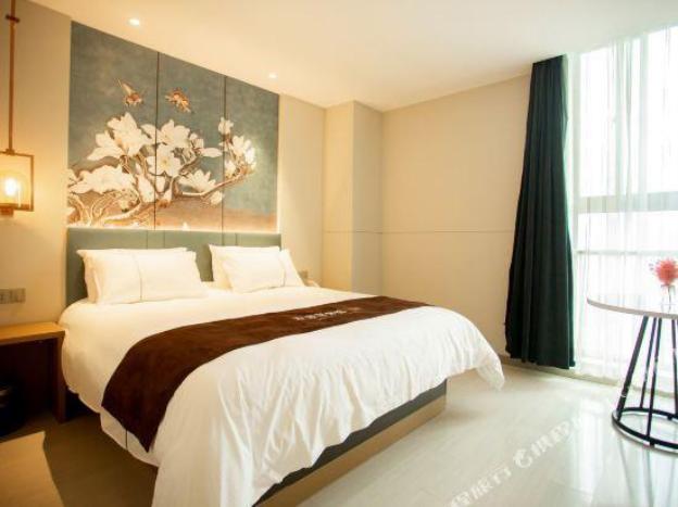 magnotel business wuxi huishan wanda plaza