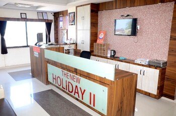 The New Holiday Ii,Mahesana>>Gandhinagar,3 star