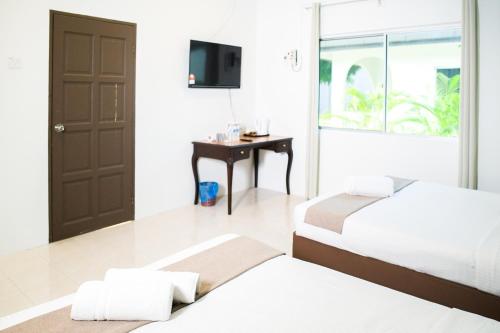 sandy garden resort