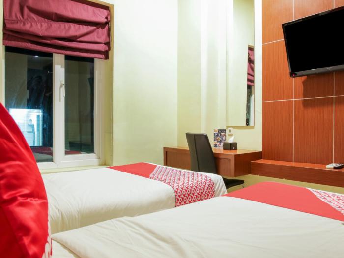 raising hotel makassar