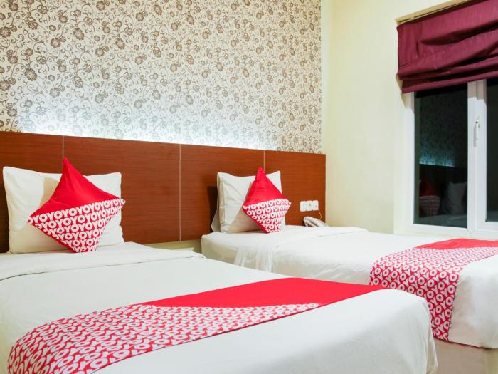 raising hotel makassar