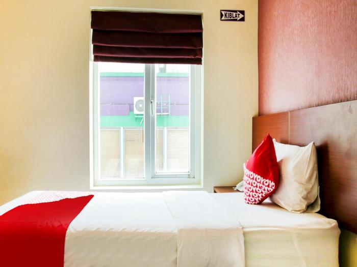 raising hotel makassar