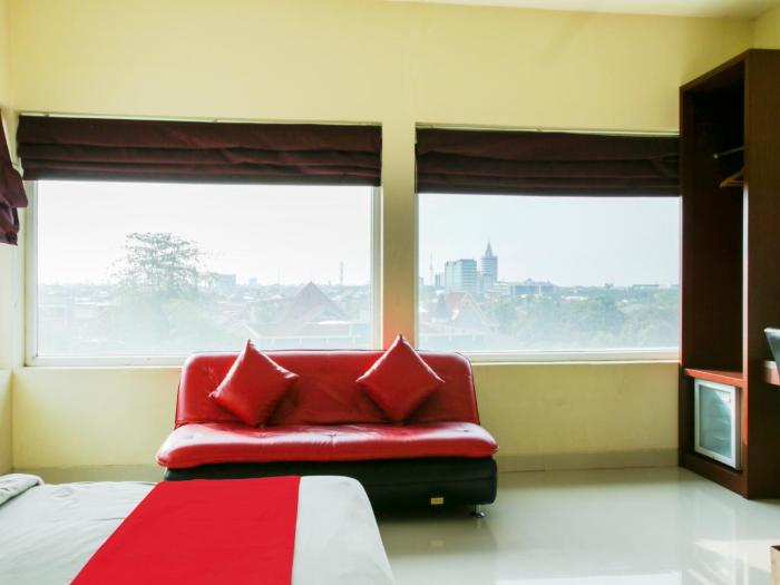raising hotel makassar
