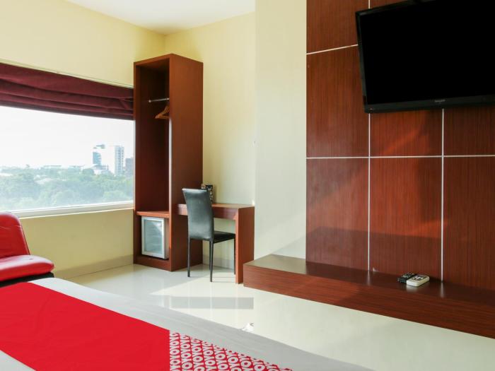raising hotel makassar