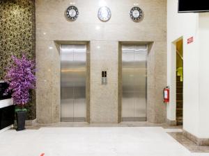 raising hotel makassar