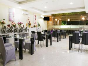 raising hotel makassar