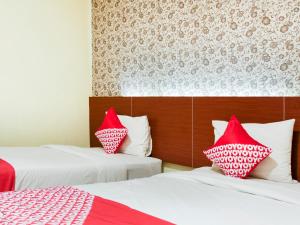 raising hotel makassar