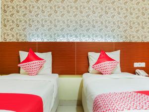 raising hotel makassar