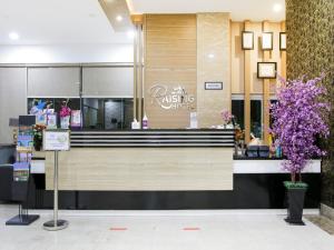 raising hotel makassar