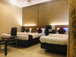 hotel sharada international