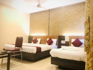 hotel sharada international