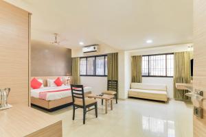 hotel sharada international