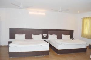 Tripli Hotels Arunoday Palace,Kodiyat,2 star