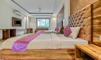 hotel swiss by treebo rooms