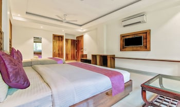 hotel swiss by treebo rooms