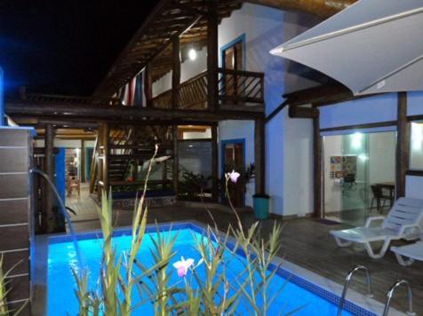 velinn pousada iguana azul