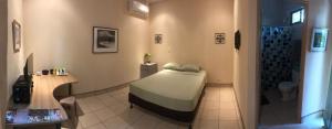 Casa Encantada Rooms,Del Super Joseth 300 Sur Y 100 Oeste Ultima Casa De Color Verde, Entrada Donde Estan Los Medidores.,3 star