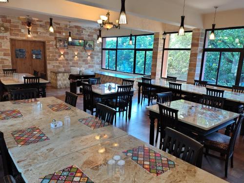 gir lions paw resort with swimming pool