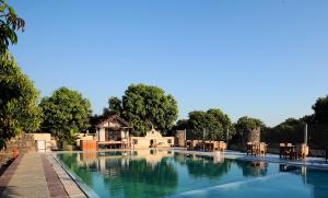 gir lions paw resort with swimming pool