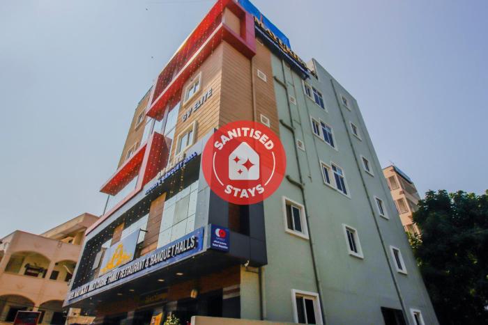 capital o76170 hotel mayukha