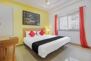 capital o76170 hotel mayukha