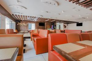 capital o76170 hotel mayukha