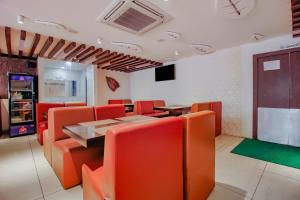 capital o76170 hotel mayukha