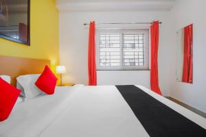 capital o76170 hotel mayukha