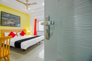 capital o76170 hotel mayukha