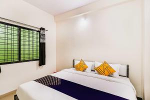 spot on 67205 hotel ajay