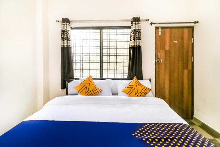 spot on 67205 hotel ajay