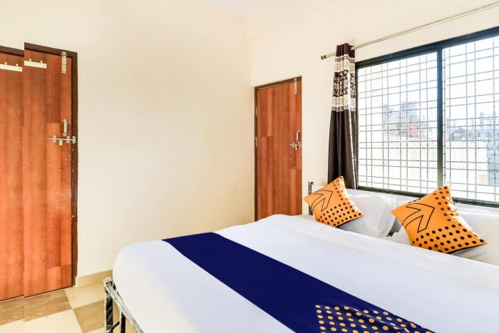 spot on 67205 hotel ajay