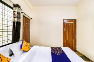 spot on 67205 hotel ajay
