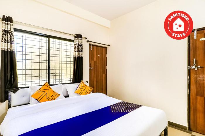 spot on 67205 hotel ajay