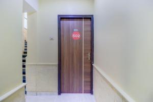 Oyo 8850 J K Regency,Pno30 Old Nagardas Rd, Gondavali Service,3 star