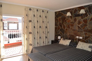 hotel la aldea suites