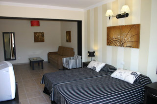 hotel la aldea suites