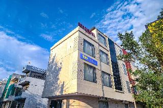 super townhouse hotel o benchmark