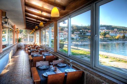 hotel playa de quenxe