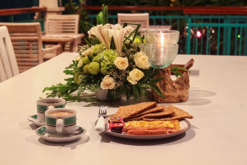 the green zhurga suites